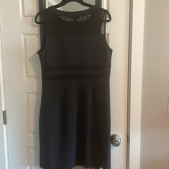 New without tags. Black mesh cut out dress by Spense. Size 12. - Picture 5 of 10